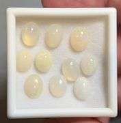 Glistening white! 8.08ct untreated Ethiopian Opal set!