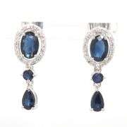 14kt White gold sapphire and diamond halo dangle earrings
