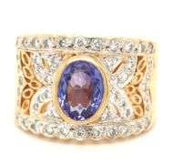 18kt Yellow gold Levian 1.21ct bezel set tanzanite and diamond open work wide ring