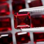 Stunning 7.36ct emerald cut cherry red Garnet set
