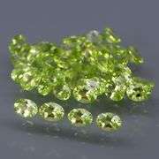 Dazzling 7.13ct untreated apple green Peridot set