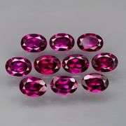 Amazing 9.38ct matched oval cut violet red Garnet set