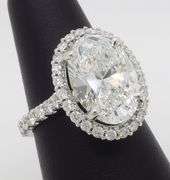 Incredible 6.77CTW Certified Diamond Halo Ring