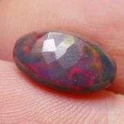 Just look at the fiery red flashing in this 2.65ct Black Opal!