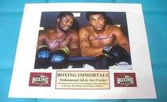 HAND SIGNED MUHAMMAD ALI AND JOE FRAZIER 5X7 IN A 8X10 DISPLAY WITH COA