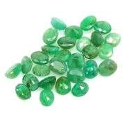 Heavy 9.56ct oval cut 28pc Zambian Emerald set!
