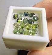 Multi-hue 5.01ct natural blue green Sapphire set