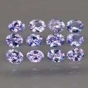 Heavy flashing! Untreated! 2.05ct oval cut Tanzanite set