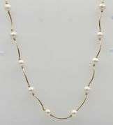 14kt Yellow gold pearl and gold Tubular link station necklace