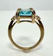 Breathtaking 14 kt Yellow Gold Plate 6.5 Ct Emerald Cut Simulated Swiss Blue Topaz Ring
