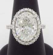 Incredible 6.77CTW Certified Diamond Halo Ring