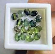 Multi-hue 5.01ct natural blue green Sapphire set