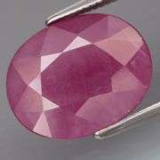 Heated only! 4.96ct rich reddish pink Ruby with a silver sheen from Mozambique!