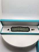 New! +10 ctw all natural emerald and diamond  weaved on fabric bracelet