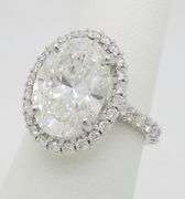 Incredible 6.77CTW Certified Diamond Halo Ring