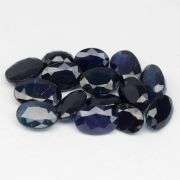 Absolutely stunning! 9.08ct ink blue Sapphire set!