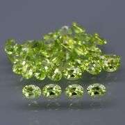 Dazzling 7.13ct untreated apple green Peridot set