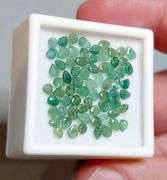 You get a beautiful mix of greens in this 6.96ct Emerald set!