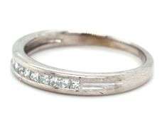 18kt White gold 0.30ctw princess cut channel set diamond band