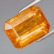 Unbelievable! 7.75ct tangerine orange emerald cut Sapphire!