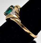 Beautiful 10K Yellow Gold Synthetic Emerald Gemstone Ring with Diamond Accents