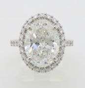 Incredible 6.77CTW Certified Diamond Halo Ring