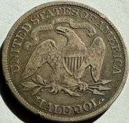 1877 Two Tone Seated Half