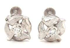 14kt White gold diamond textured flower clip on earrings