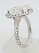Incredible 6.77CTW Certified Diamond Halo Ring