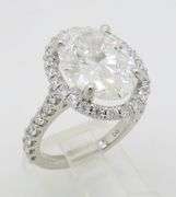 Incredible 6.77CTW Certified Diamond Halo Ring