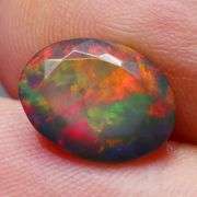 Just look at the fiery red flashing in this 2.65ct Black Opal!