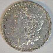 Choice original AU 1886-O Morgan Silver Dollar. Key date