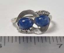 Mesmerizing 14K white Gold Star Sapphire Gemstone Ring with Diamond Accents