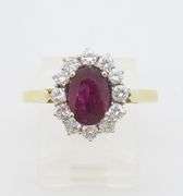 Beautiful 18k Gold Ruby & Diamond Halo ring