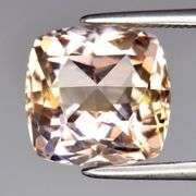 Premium grade VVS 4.18ct rose cushion peach Ametrine!