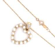 10kt Yellow gold 3mm pearl and diamond heart shaped pendant on chain