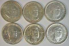 5 Flashy AU BTW and one WC Commemorative Half Dollars. (6 coins)