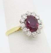 Beautiful 18k Gold Ruby & Diamond Halo ring