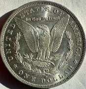 1883 O BU Morgan Dollar.