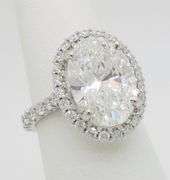 Incredible 6.77CTW Certified Diamond Halo Ring