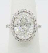 Incredible 6.77CTW Certified Diamond Halo Ring