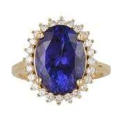New 6.50ct Oval Tanzanite and 0.52ctw Diamond Frame Ring in 14K