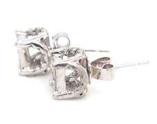 14kt White gold 1.20ctw invisible set diamond under halo stud earrings