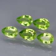 Dazzling 4.81ct untreated apple green Peridot set