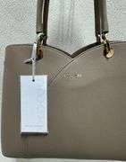 Beige Color Hand Bag by David Jones Paris