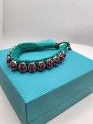 New! +10 ctw all natural rubys and diamond weaved on fabric bracelet