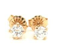 One pair of 14kt yellow gold RBC diamond stud earrings