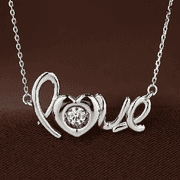 Beautiful "love" center stone dancing pendant