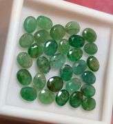 Heavy 10.43ct oval cut 30pc Zambian Emerald set!