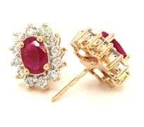14kt Yellow gold oval ruby with RBC diamond halo earrings